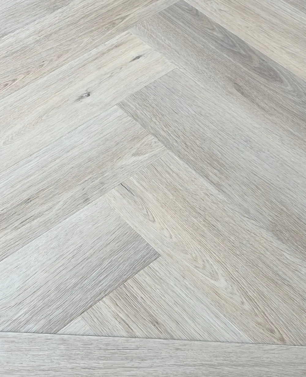 Visgraat-PVC in lichte eikenlook